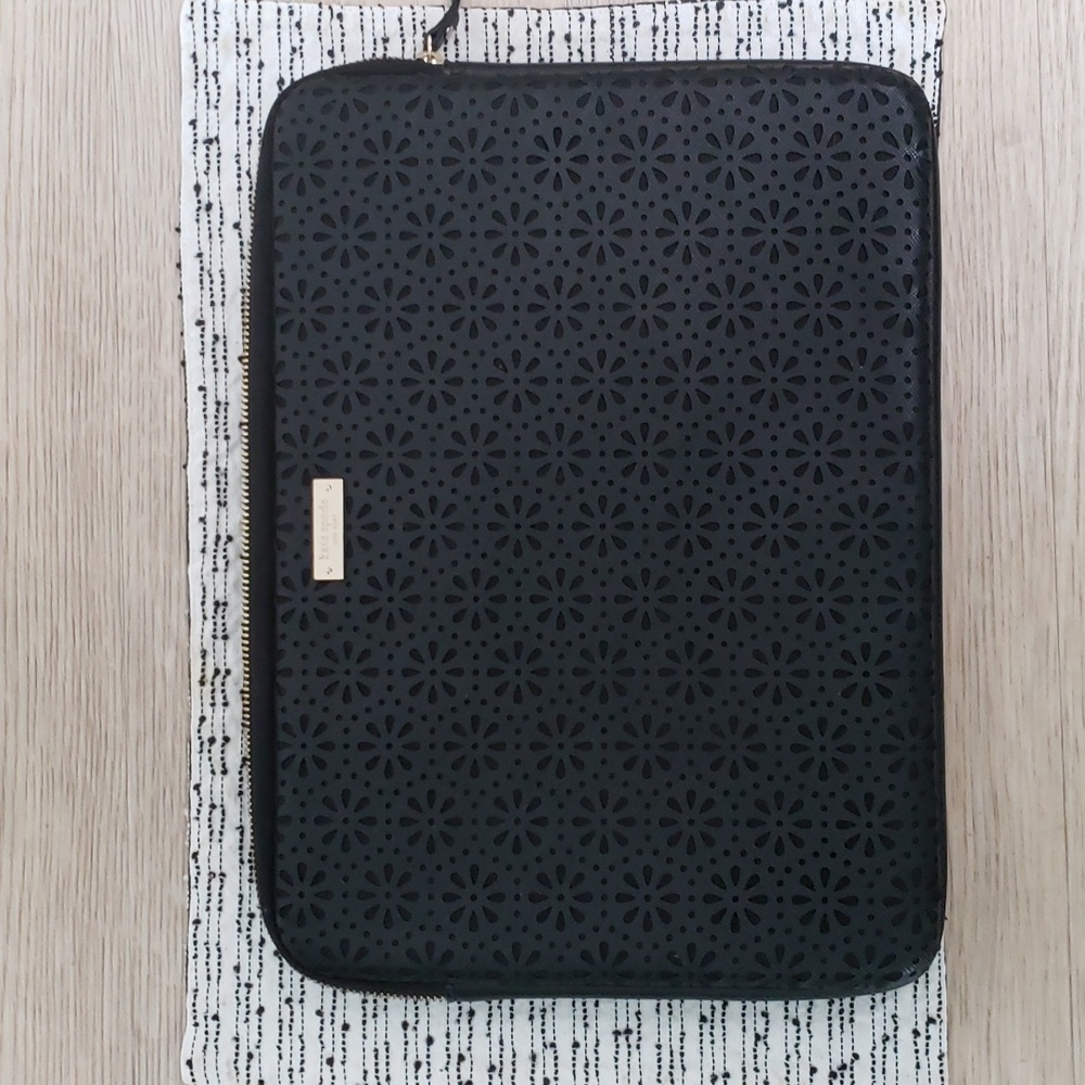 Kate Spade black padded 13" laptop sleeve.